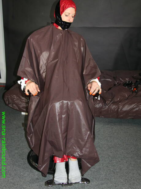 Shiny Nylon Arts Rain Bound invites you to browse their xxx photos with lassy in weird bdsm scene